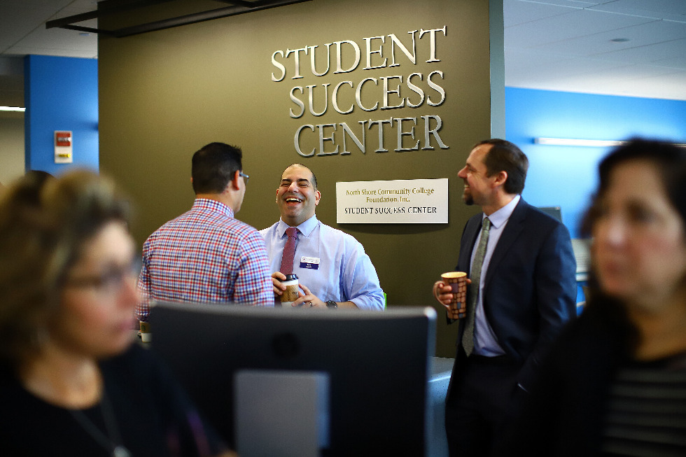 Men standing in Student Support and Success Center
